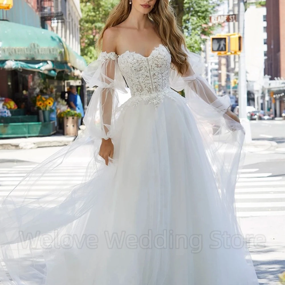 Exquisite Applique Wedding Dress Sweetheart A-Line Bridal Tulle Floor Length Strapless Open Back with Detachable Long Sleeves