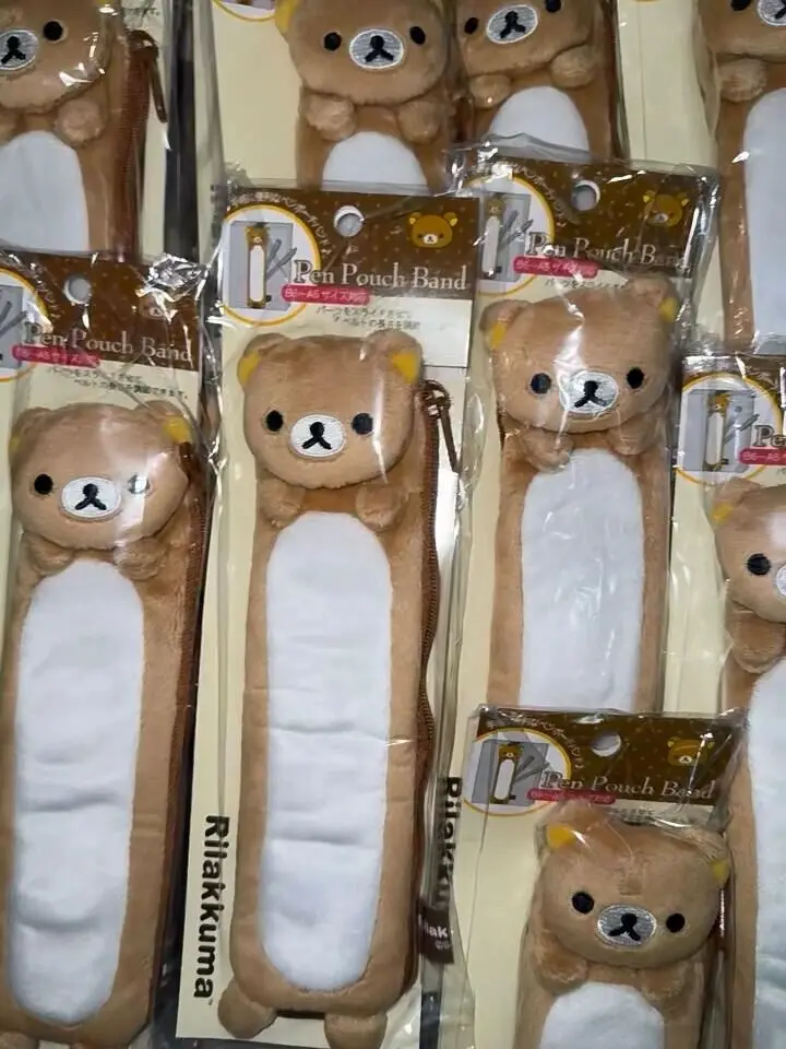 Nowe śliczne Rilakkuma Korilakkuma Mini pluszowe piórniki dla dziewczynek dzieci niedźwiedź szkolny Anime etui na długopisy opaska pojemnik