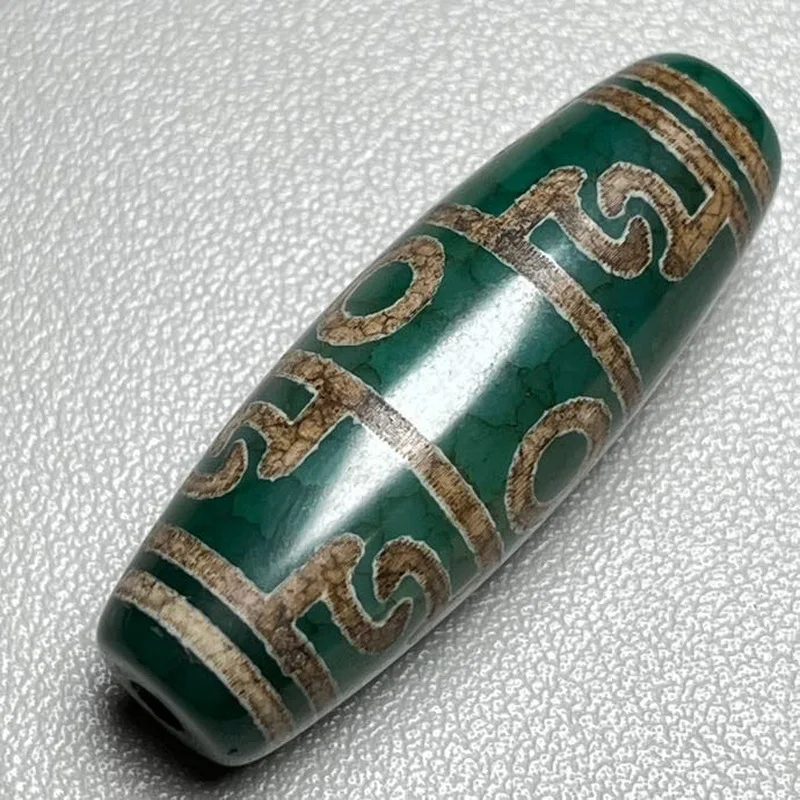 Antique and miscellaneous items returned from Tibet: green dragon-patterned old agate Lotus Master's instrument, three-eyed vint