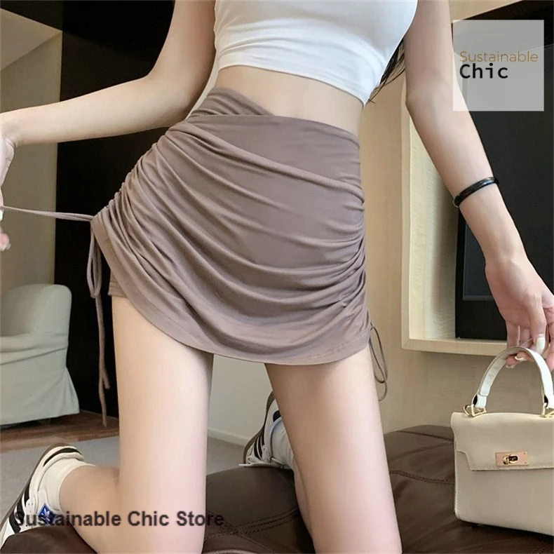 

Korean sexy drawstring pleated skirt female summer design sense high waist slim hot girl bag hip anti-exposure versatile skirt
