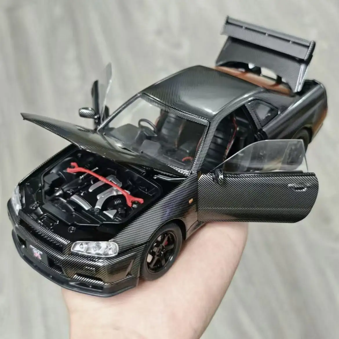 

Моделирование 1:24 GTR R34, дверная модель из сплава из углеродного волокна, модель автомобиля, звук и свет, игрушка-симулятор, коллекционный подарок с высокими деталями
