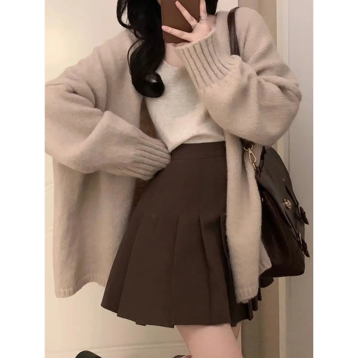 Spring Wear Female 2023 New Korean Version of The Hundred with Suspenders Loose Cardigan Thin Pleated Skirt Three-piece Set