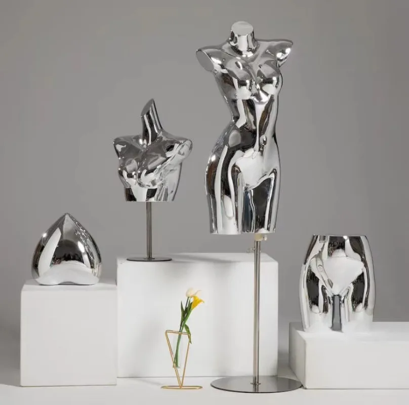 Custom shiny gold mannequins for clothing window displays
