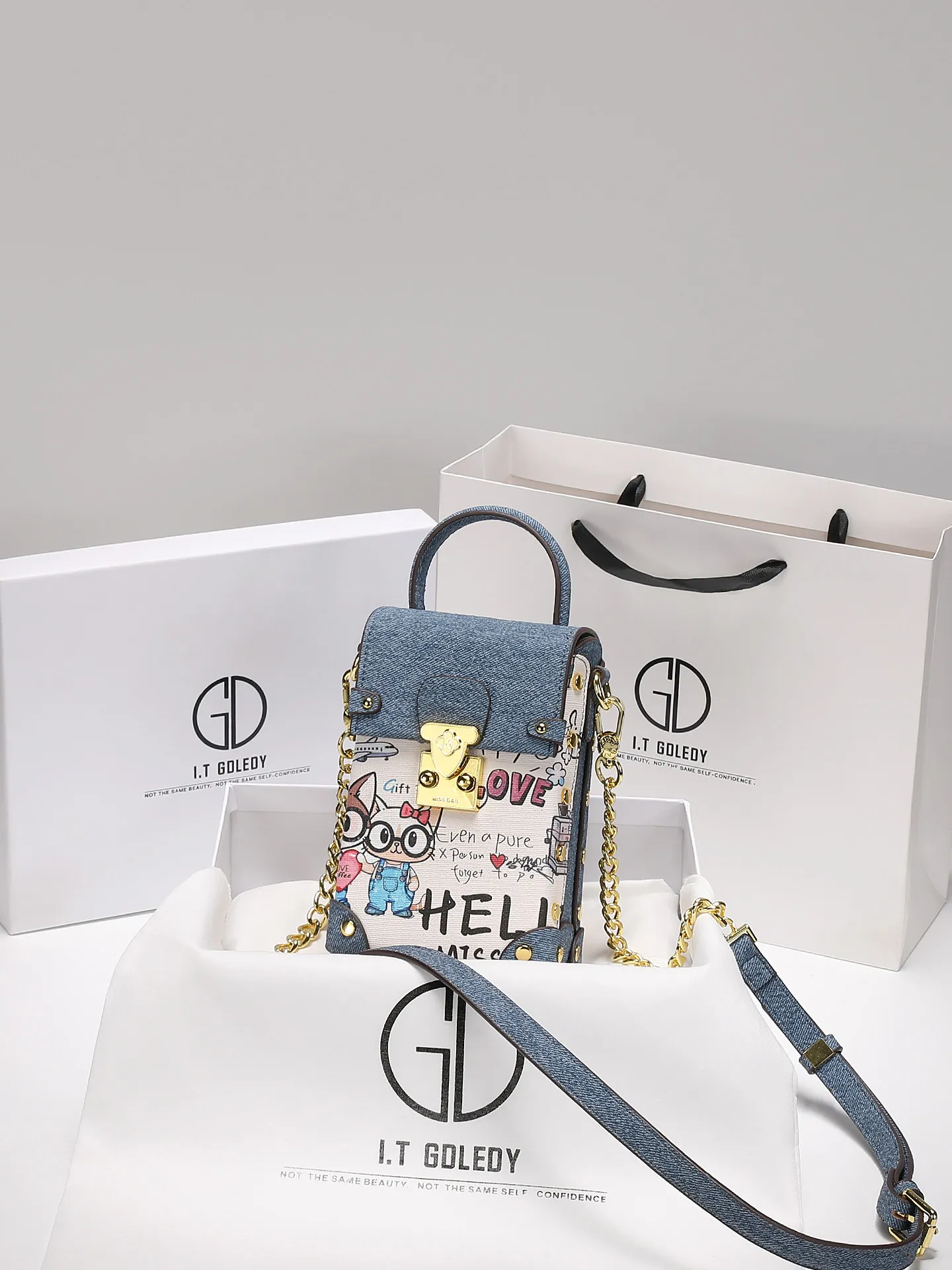 Luxury and Fashion Handheld Mobile Phone Bag with Popular Cartoon Graffiti and Premium Denim Canvas Women Trendy Crossbody Bag