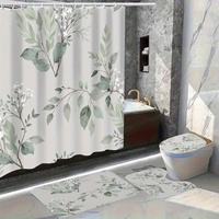 4-piece shower curtain set. Elegant leaf print shower curtain set includes matching bath mat and toilet seat cover