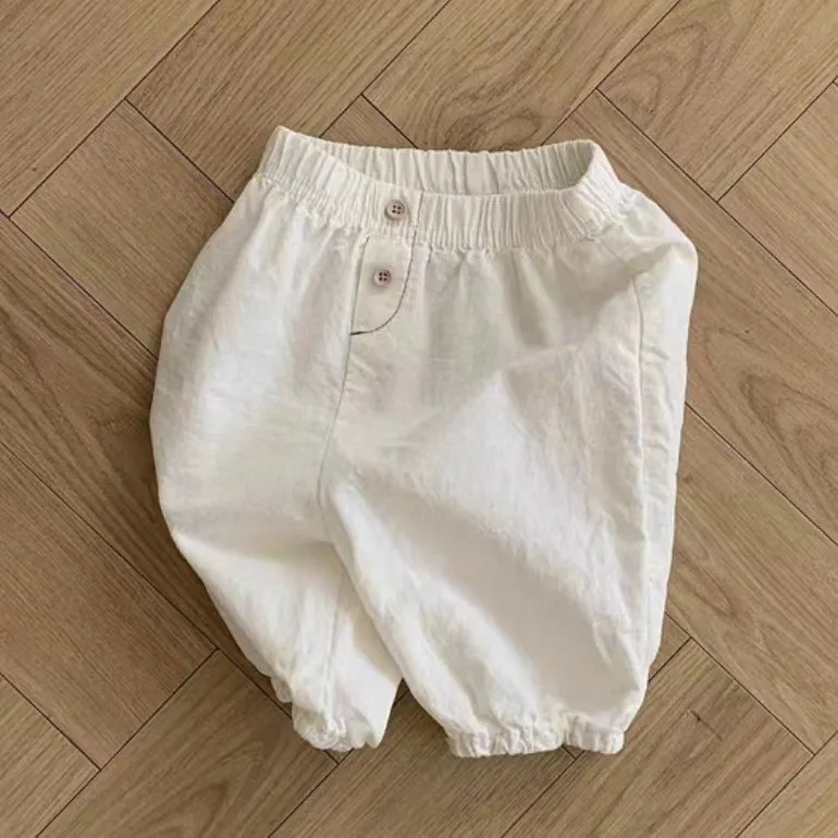 Pantaloni per bambini ragazzi coreani ragazze bambino traspirante tinta unita Versatile morbido Comfort elastico in vita 2024 bottone moda sciolto