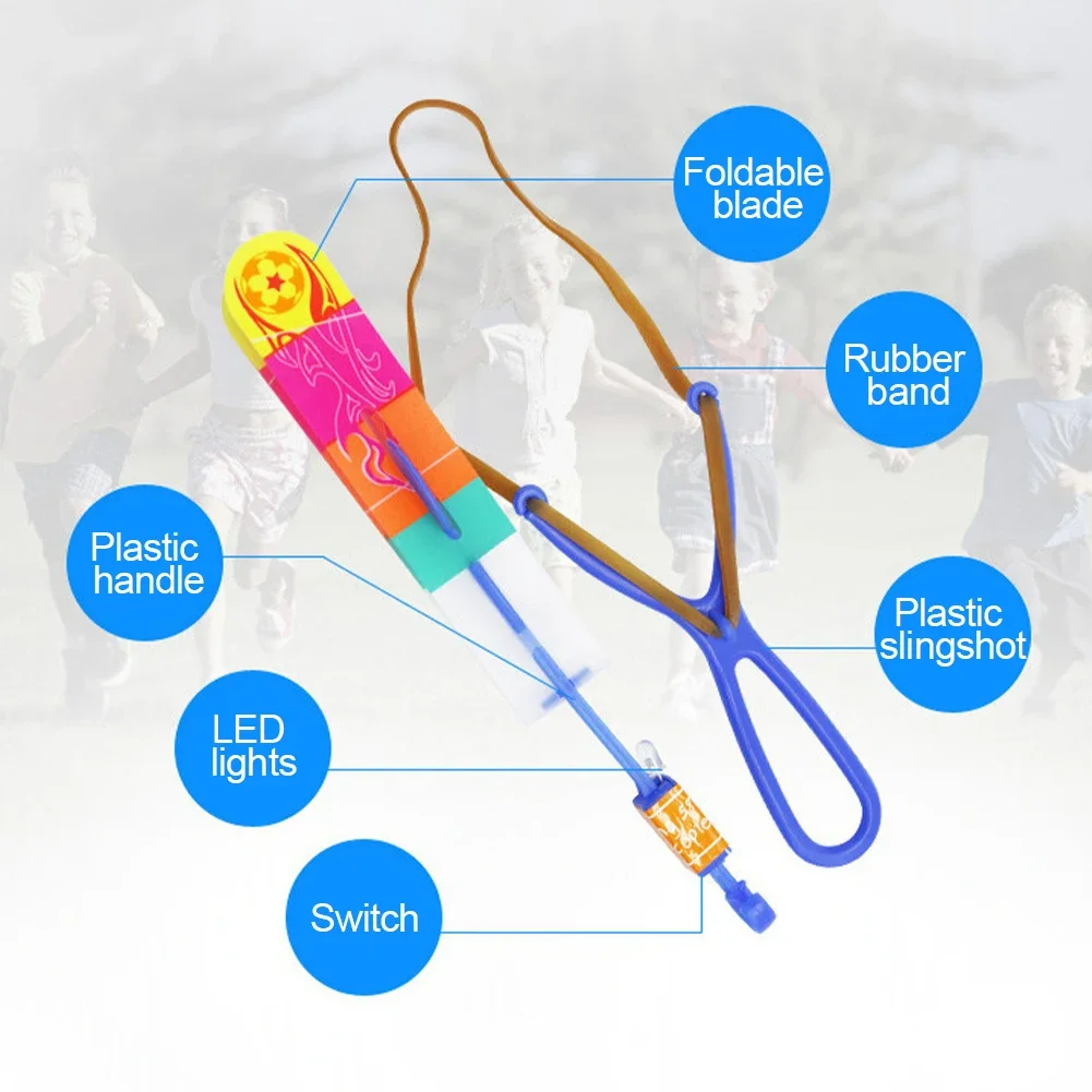 屋外の光沢のあるロケットフラッシュ,パチンコ,伸縮性のあるヘリコプター,回転する飛行玩具,子供向けの矢印ギフト,妖精のカタパルト,1個
