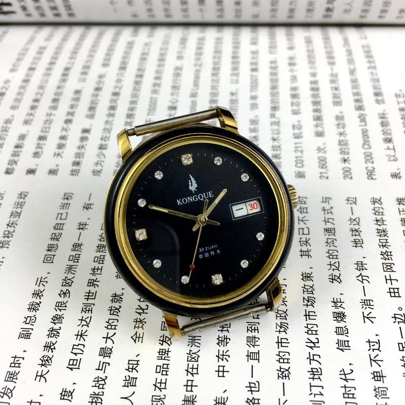 

Original Peacock Brand Black Diamond Double Calendar Fully Automatic Mechanical Watch with a diameter of 37mm and a strap