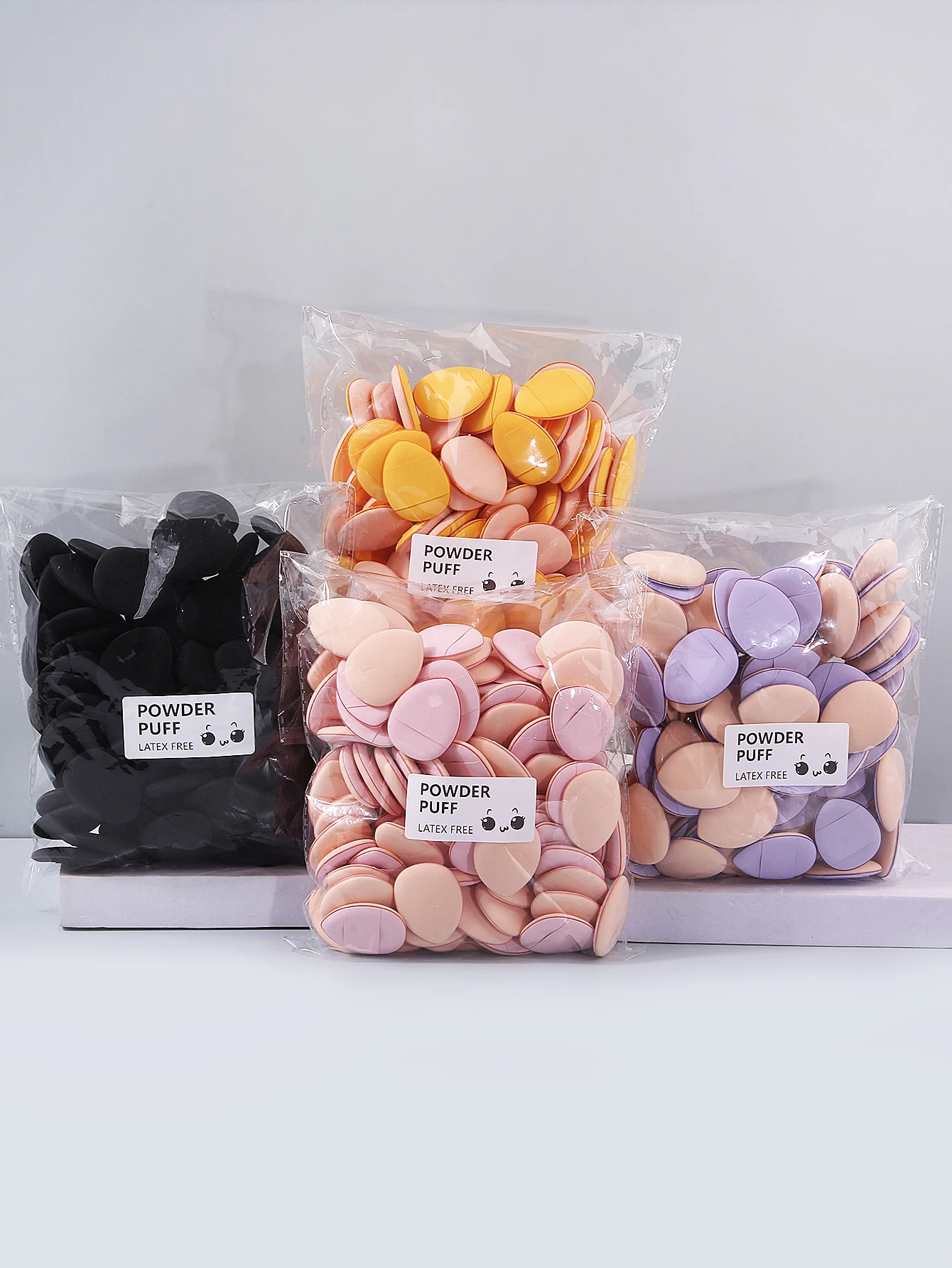 Nouveau 100 pièces Mini bouffées de poudre de doigt éponge douce Non absorbante de poudre double usage pour fond de teint correcteur maquillage Portable tactiles