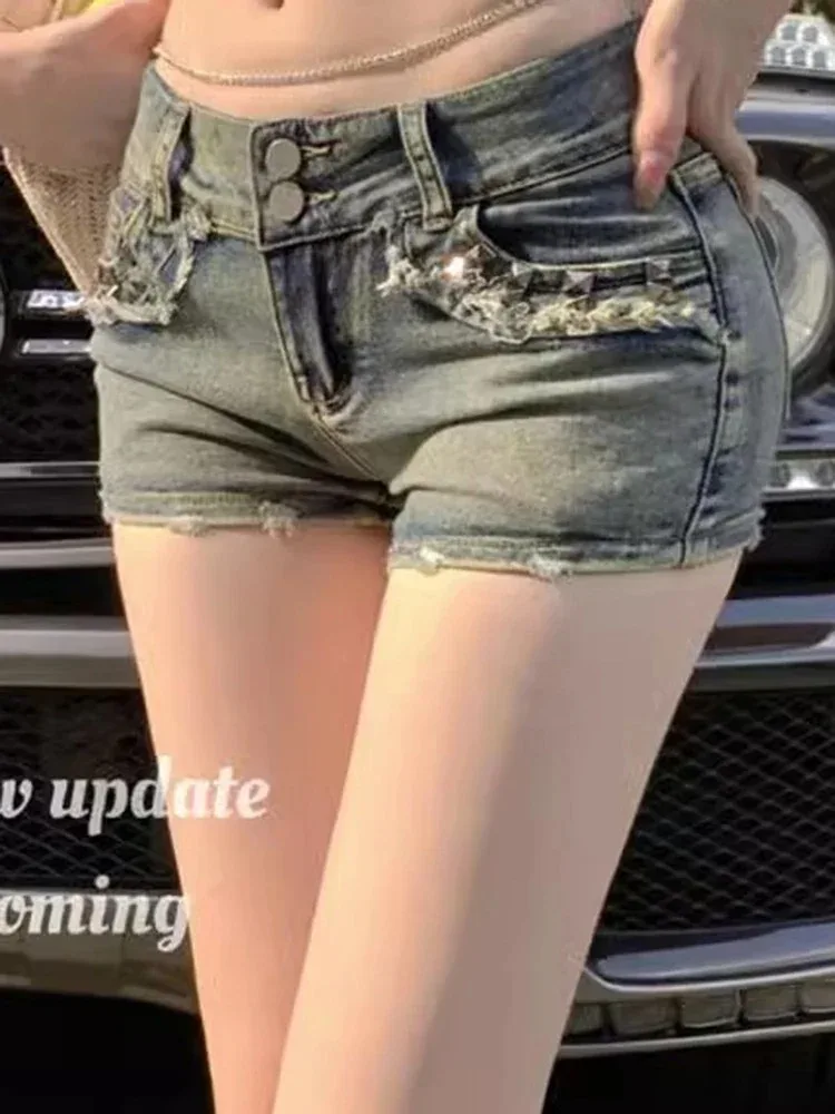 Pantaloncini coreani retrò Y2k da donna Pantaloni Lady Vintage High Street Hot Pants Jeans corti all'anca avvolti elastici a vita bassa blu femminile