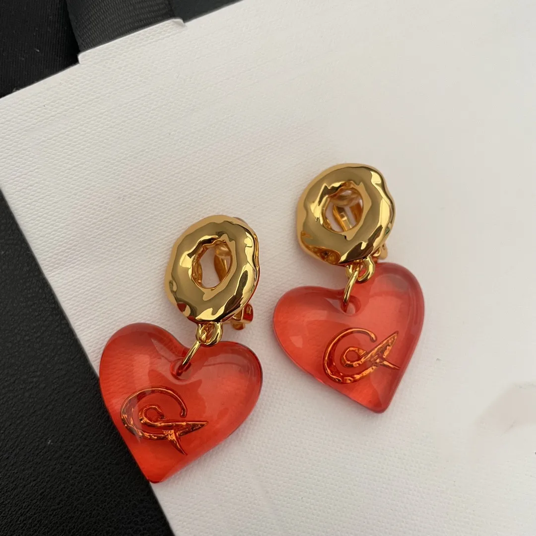 

Mid ancient style red peach heart ear clip
