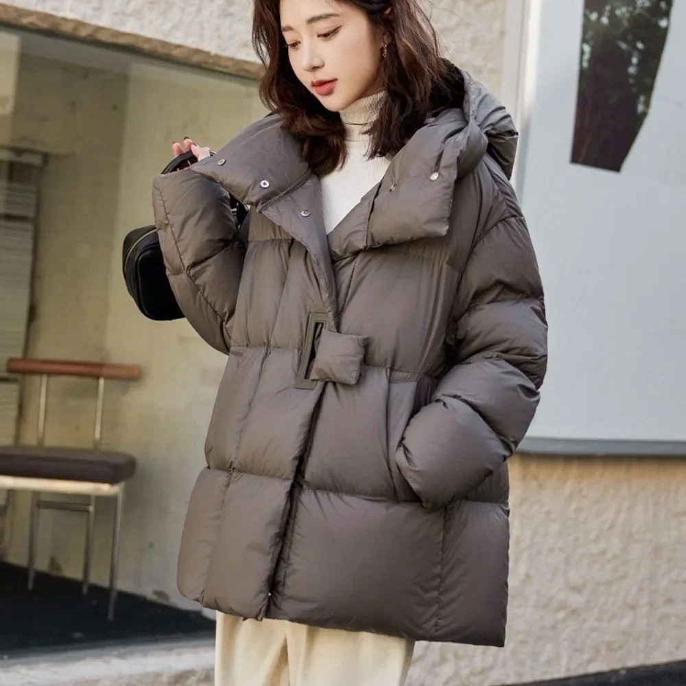 新しい秋冬服女性暖かいフード付きホワイトダックダウンコート女性ふわふわパーカールーズ特大フグコート生き抜く