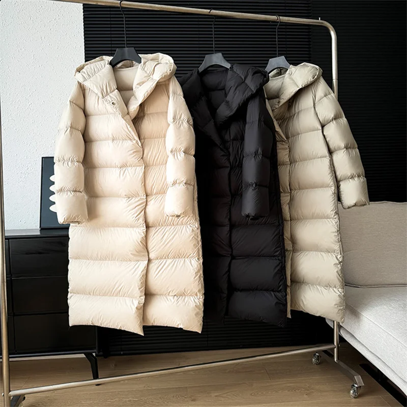 2025 invierno nuevo abrigo con capucha de plumón de pato blanco chaqueta de plumas gruesa y esponjosa coreana para mujer abrigo largo a prueba de viento para mujer