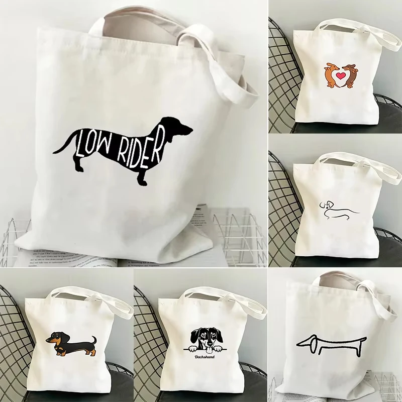 2026 Lentil Dog Printed Canvas Handbag - Beautiful sausage-shaped puppy pattern design, suitable for daily shopping use