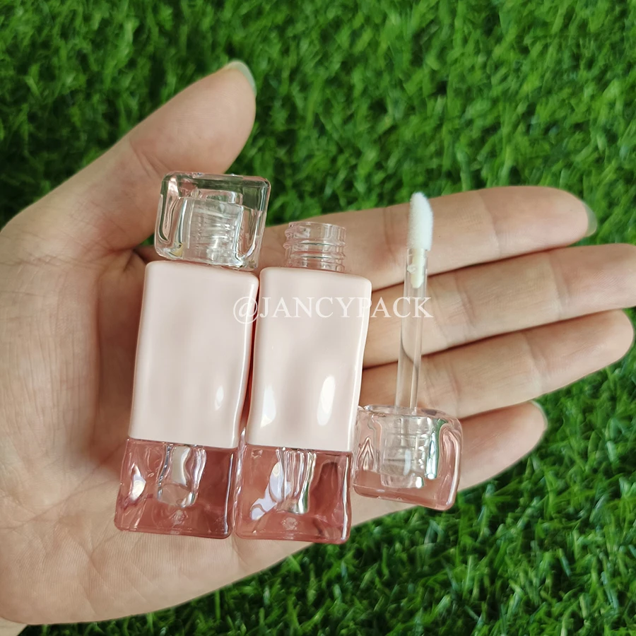 تصميم جديد 2 مل الوردي تويست فريد أنبوب ملمع الشفاه الفارغ أنابيب زيت الشفاه شعار مخصص تغليف مستحضرات التجميل