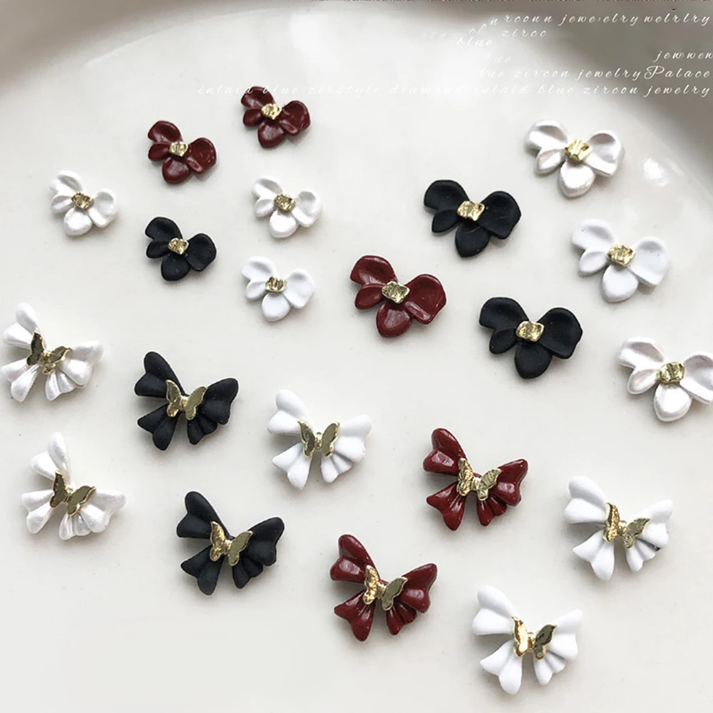 5 pezzi bianco/nero/vino rosso farfalla fiore decorazioni per unghie artistiche fiocco in lega 3D ciondoli per unghie eleganti accessori per unghie artigianali alla moda
