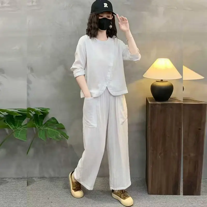 ชุดเซ็ตสองชิ้นสไตล์จีนสำหรับผู้หญิง ฤดูใบไม้ร่วงปี 2025 เสื้อแขนเจ็ดส่วนแฟชั่นลำลอง กางเกงฮาเร็มทรงหลวม
