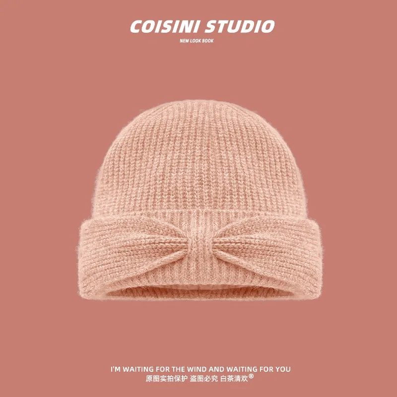 Koreanischer Stil Herbst- und Winter-Strickmütze mit einfacher Schleife für Damen, warme Ohrenschutz-Beanie-Mütze für Herbst und Winter. – Detail 3