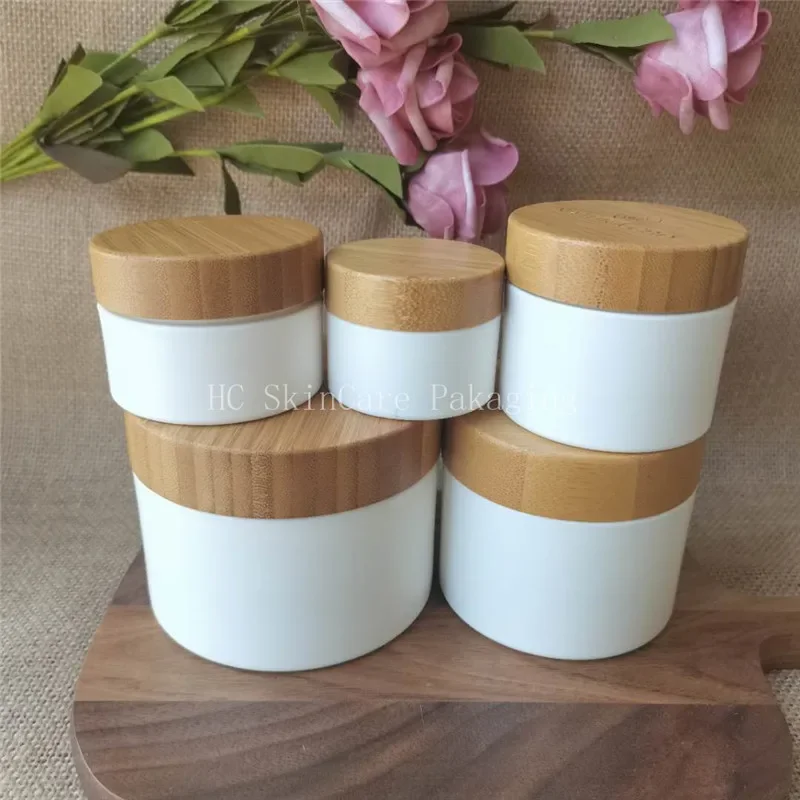 

Eco Friendly Cream Container White Plastic With Bamboo Cap Cosmetic Jar Box Makeup Face Cream Lotion Cosmetic Hair MaskContainer