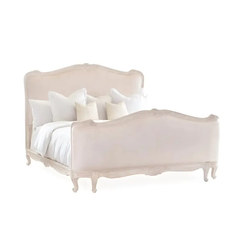 French Louis XV-style luxury villa bedroom with a solid wood, hand-carved, vintage king-size bed