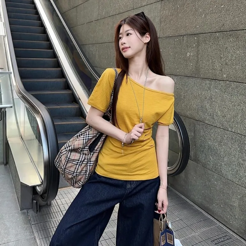 夏の女性のための怠惰なオフショルダー半袖 T シャツ新しいタロパープル斜め肩ワンショルダースリムトップ