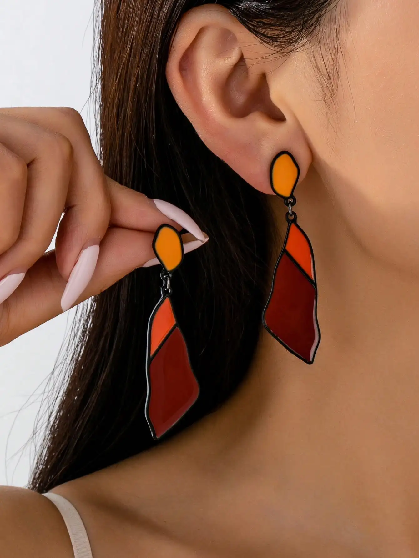A Pair of Black Women's Earrings with a Trendy, Sexy, Fashionable, Casual, and Versatile Design