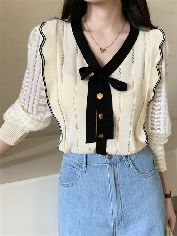 เสื้อสเวตเตอร์ถักไหมพรมคอวีสไตล์เกาหลีสำหรับผู้หญิง รุ่นใหม่ล่าสุดสำหรับฤดูใบไม้ร่วง ดีไซน์ผูกโบว์คาดเอว แต่งผ้าแบบต่อผ้า สไตล์เกาหลี