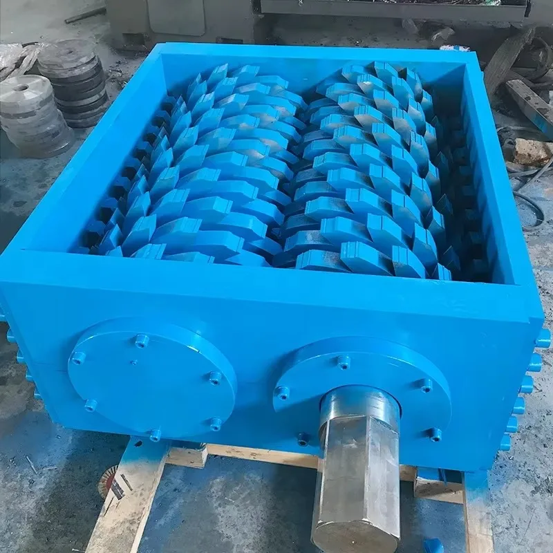 

Измельчитель с двойным валом с большими соломенными зубьями для переработки картонных коробок - технология резки типа ножа