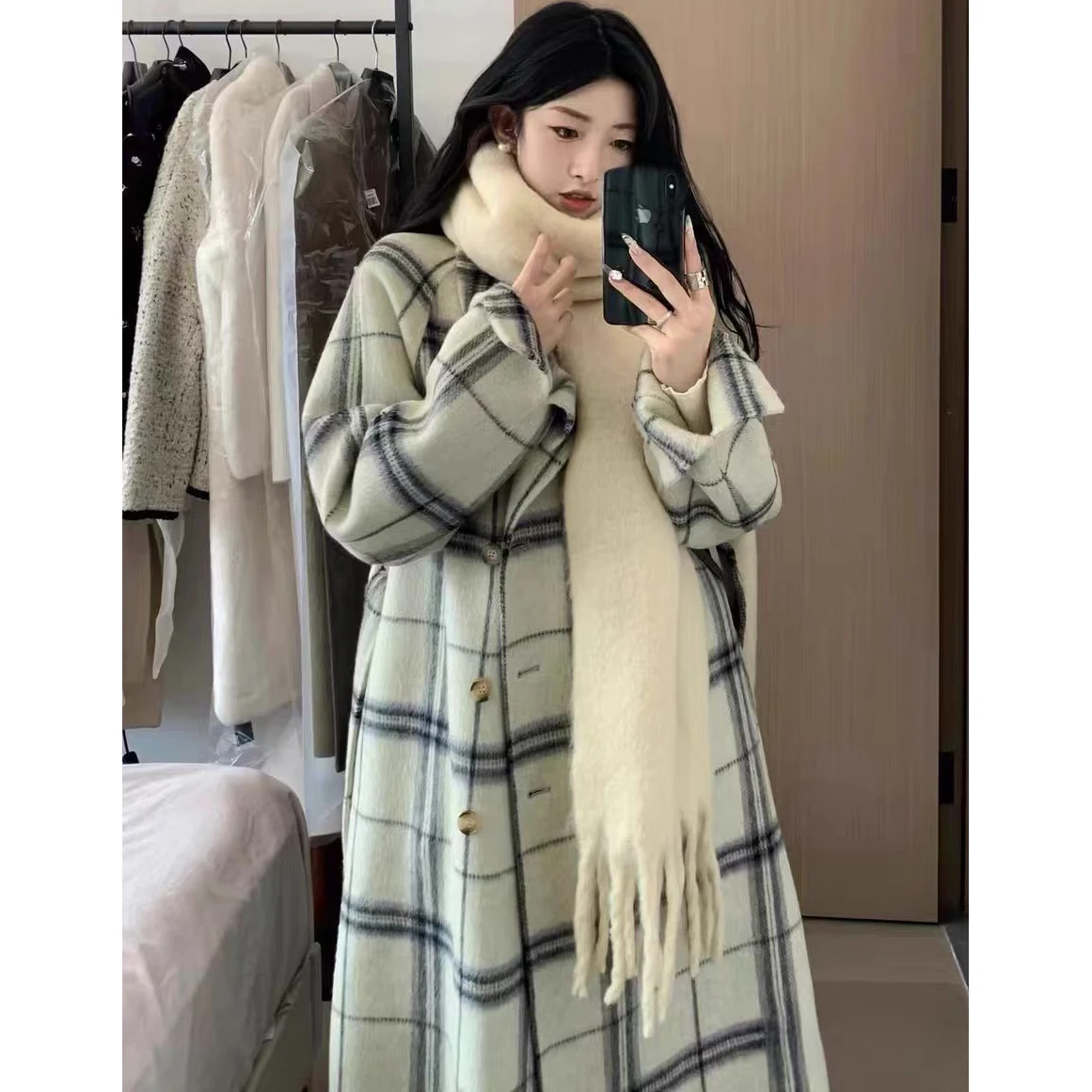 Giacca a vento in lana scozzese chic Cappotto da donna 2026 Autunno Inverno Nuovo trench lungo in lana allentato con cintura coreana