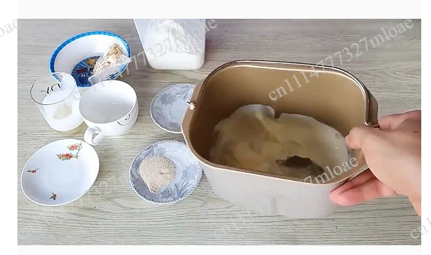 Stainless steel bread maker with fruit and nut dispenser, non-stick ceramic baking pan and digital touch panel