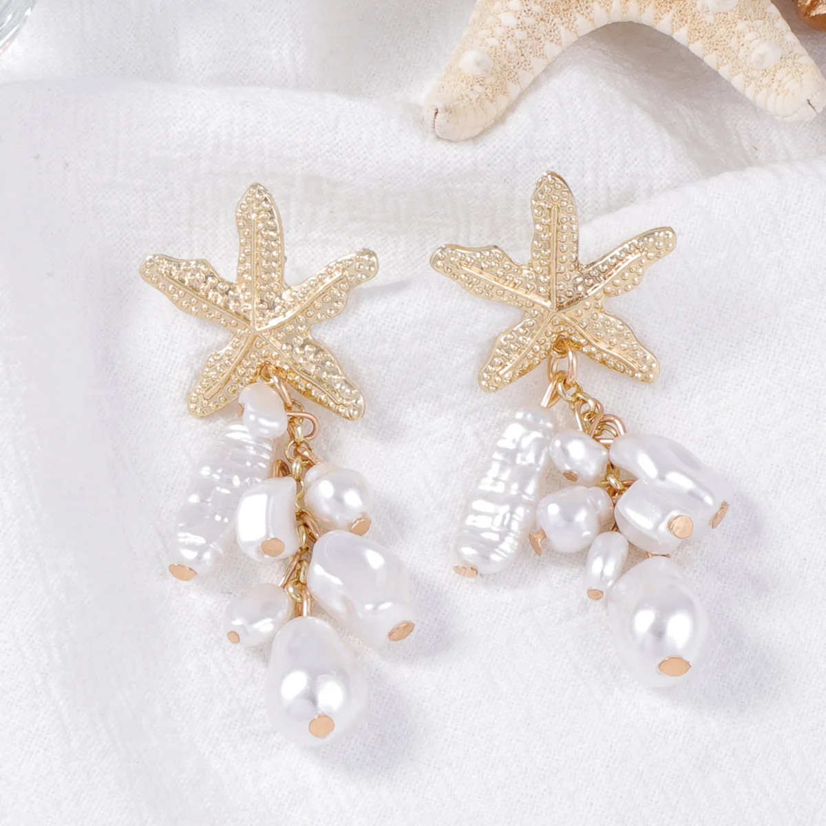 Temperament Fashion Niche Ocean Resort Wind Alloy Starfish Imitation Pearl Pearl Pendant Fringed Earrings Women's