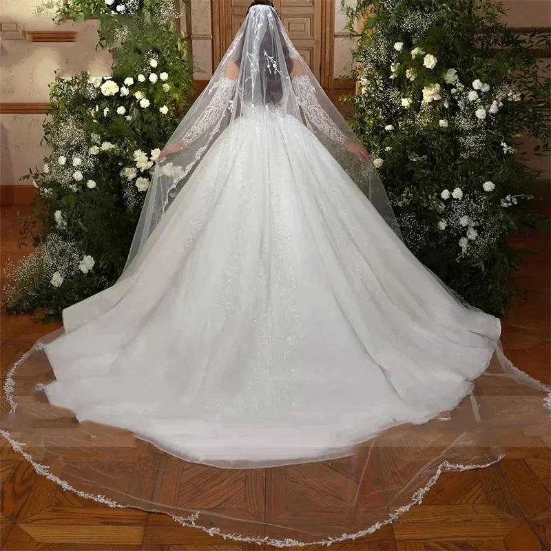 Aangepaste luxe borduurwerk kralen applicaties lange mouw trouwjurk ronde hals vestido de novia baljurk bruidsjurk