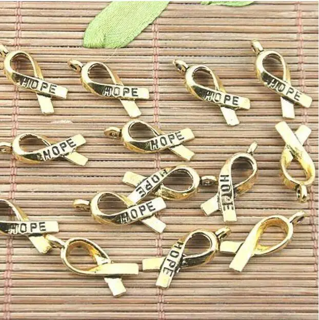 40pcs 18x7mm,loop:1mm Tibetan Silver dark gold color HOPE cancer awareness ribbon design charms HWH1168 HWH0556