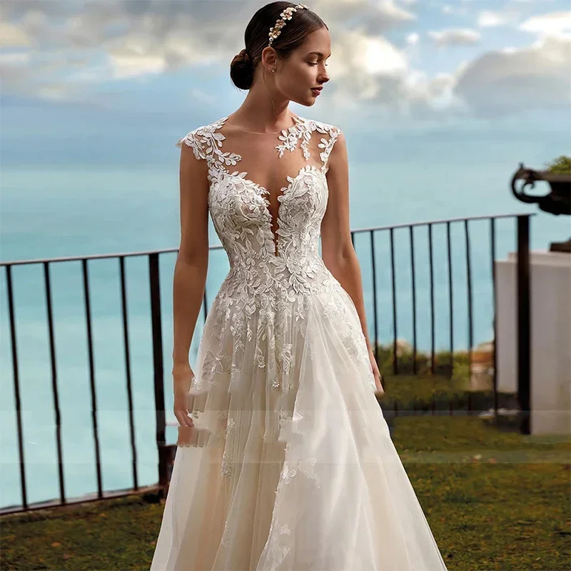 Flavinke カスタマイズされたボヘミアン A ラインのウェディングドレスオーガンザレースの花嫁ドレス O ネックノースリーブアップリケ夜会服ローブデマリー