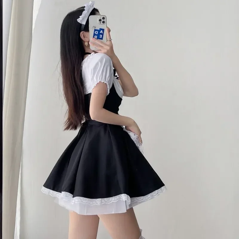 Traje de sirvienta de corte bajo japonés para mujer, delantal blanco y negro de manga corta de Anime, vestido con corsé de Lolita, disfraz de Cosplay de una pieza