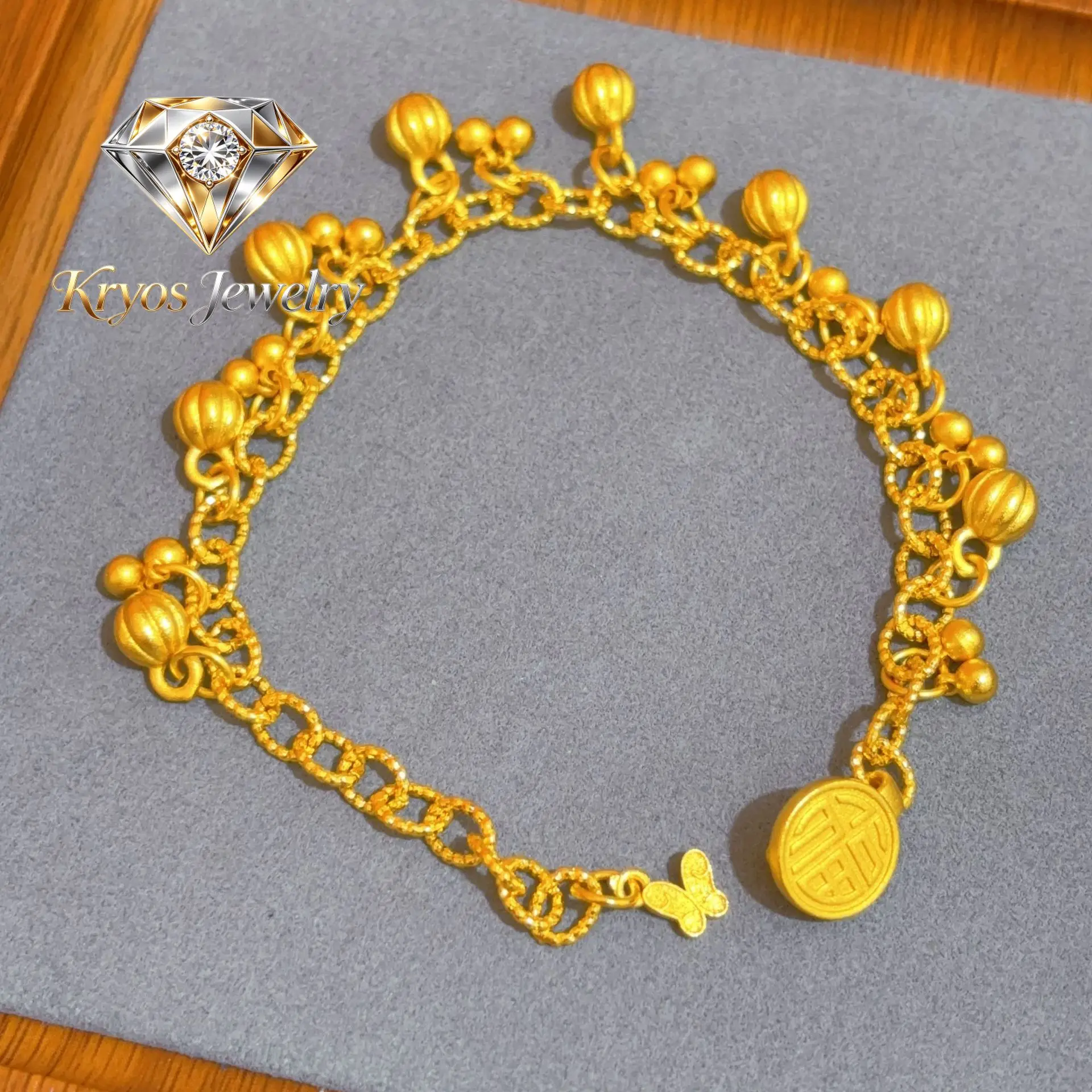 

Kryos Jewelry Women's 24K Gold (AU999) Exotic Bell Fruit Bracelet | Gradient matte bell, hammered glow with enamel pattern