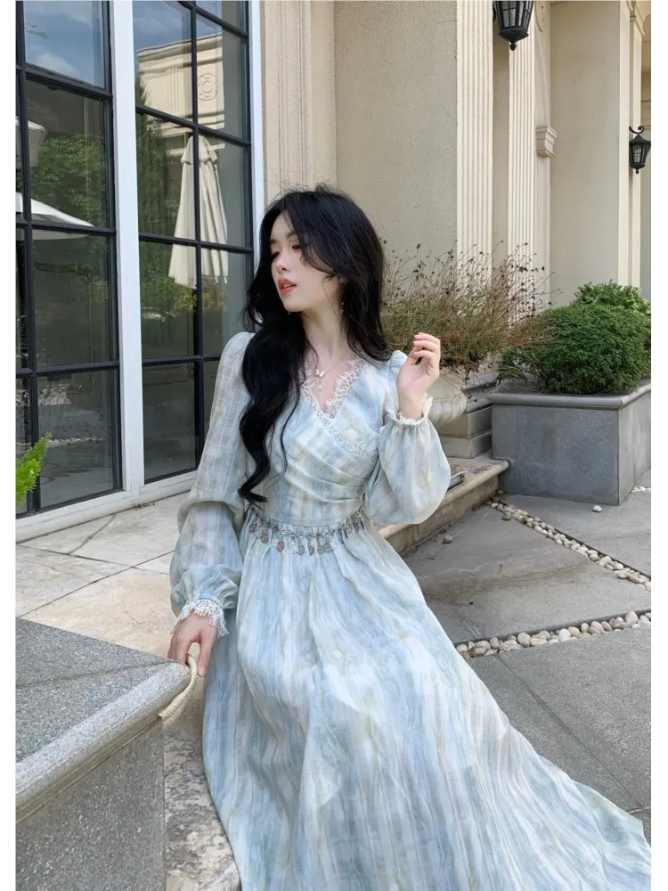 

A stylish blue tie-dyed lace collared long-sleeved dress