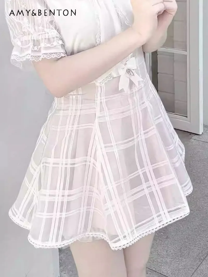 

Japanese Girl Temperament Fairy Style Sweet Cute Rhinestone Bow High Waist Plaid Mini Skirt Mine Series Mass-Produced Mini Skirt