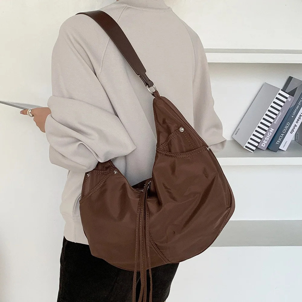 Korean version nylon dumpling bag for women, versatile and lazy style commuting shoulder bag, large capacity casual armpit bag
