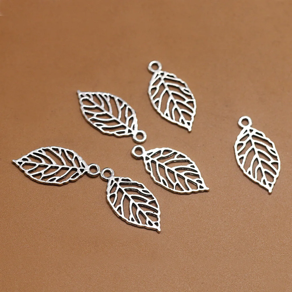 

50pcs Alloy Retro Pendants Hollow out Leaf Charms DIY Jewelry Making Accessory for Necklace Crafts ( Silver)
