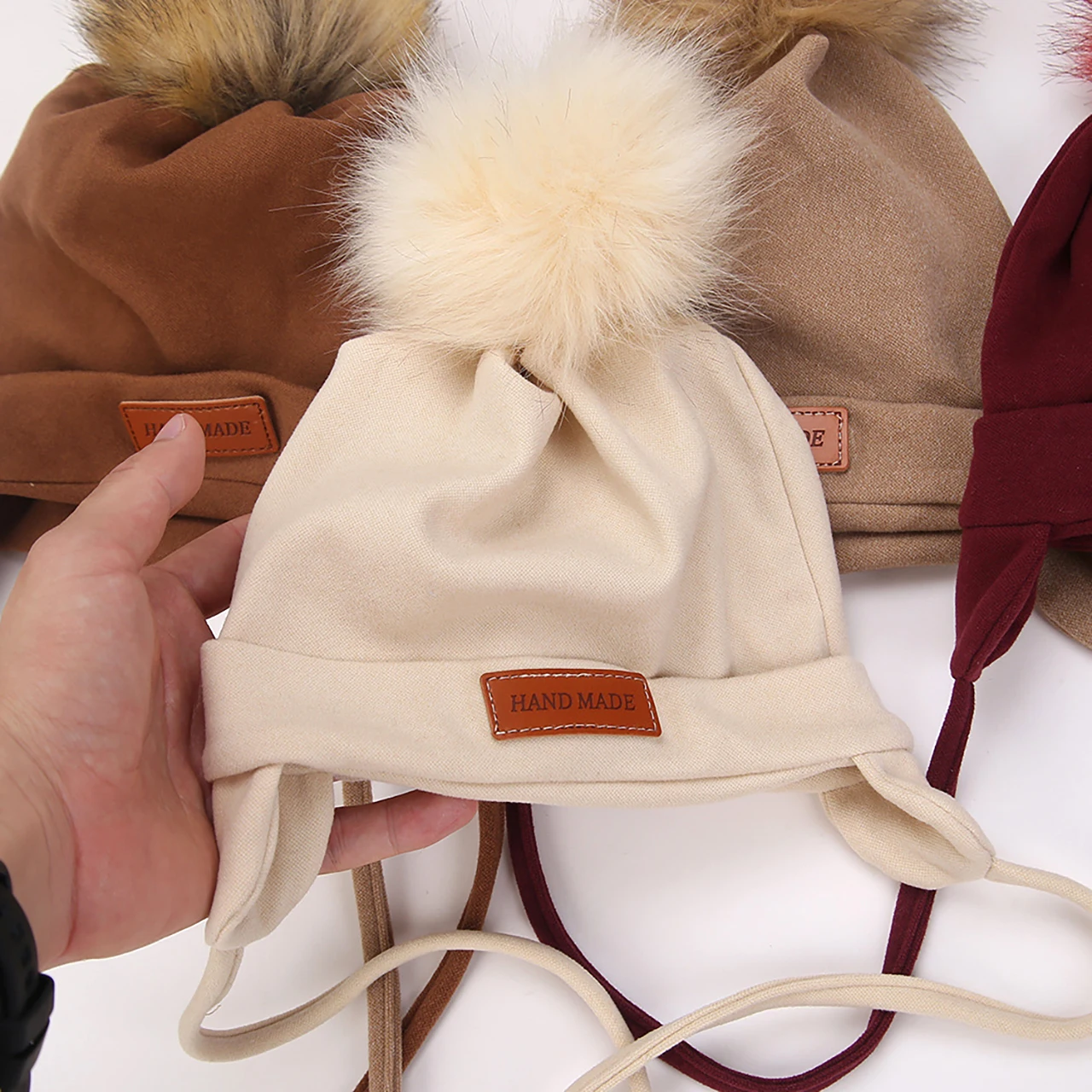 

Пушистая меховая детская шапка для защиты ушей, детские наушники с помпоном, зимняя плюшевая шапочка для новорожденных, шерстяные пуловеры для детей 0-2 лет