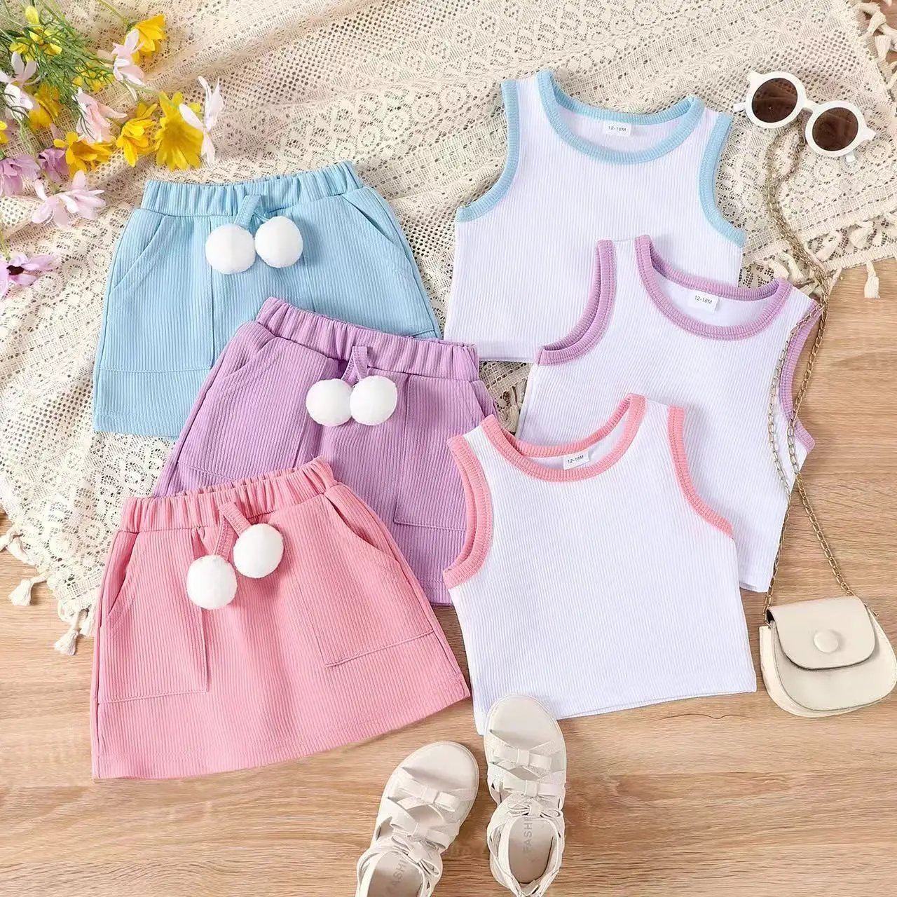 

2026 New Summer Girls Ribbed Sleeveless Vest & Solid Color Skirt With Pom Two Piece Set for 12M-4Y
