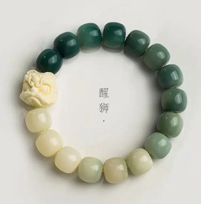 Bracciale Bodhi a cambiamento graduale del leone in aumento femminile radice di giada bianca dito morbido che gioca con la palla di Buddha piatto maschile