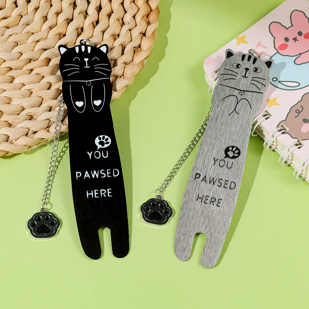 

Cute Cat Stainless Steel Bookmark with “YOU PAWSED HERE” Design and Elegant Cat Paw Pendant – The Perfect Gift for Cat Lovers