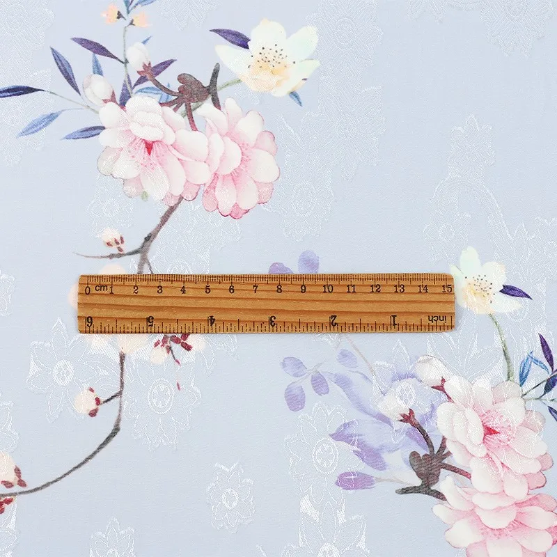 Pakaian wanita cheongsam dan kain gaun bermotif