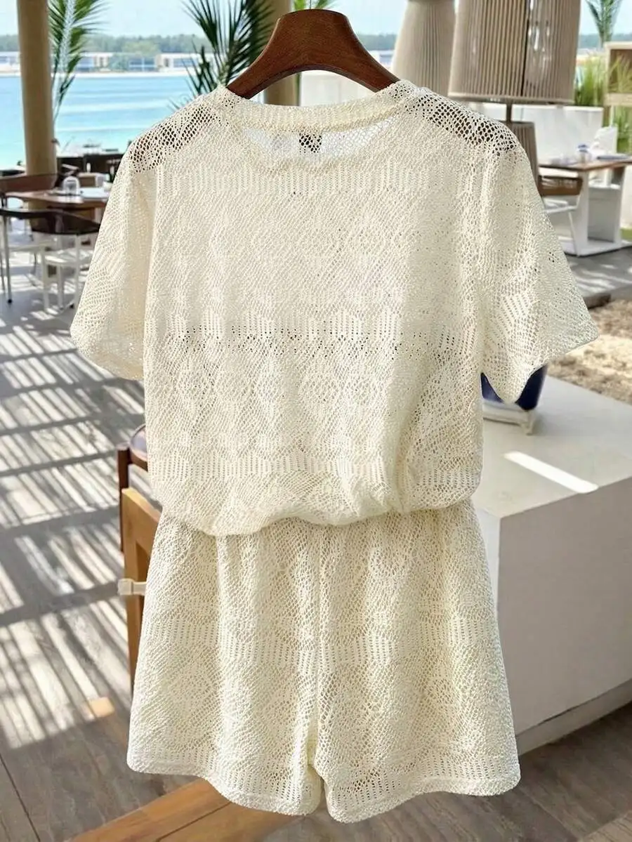

Cream White Hollow-Out Jacquard Knit 2-Piece Set Summer Casual Beach Vacation Loose Round Neck T-Shirt And High Waist Shorts