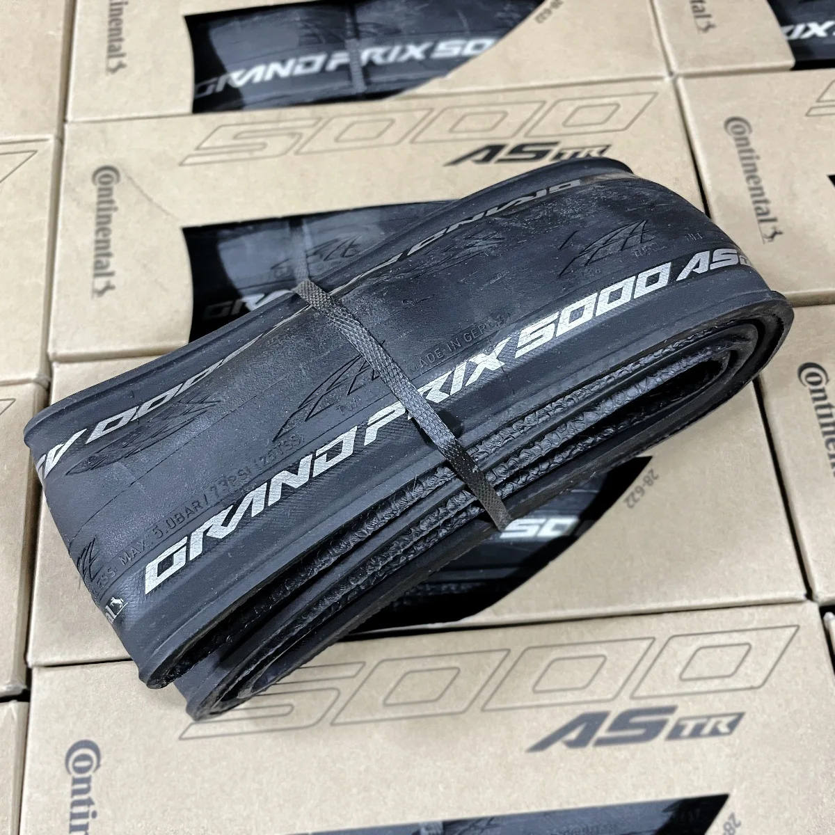 Neumático Continental GP5000 New GrandPrix AS TR para Todas las Estaciones 700x28/32/35 AS TR Negro/Crema Reflex Tubeless Ready para Bicicletas Plegables 700C