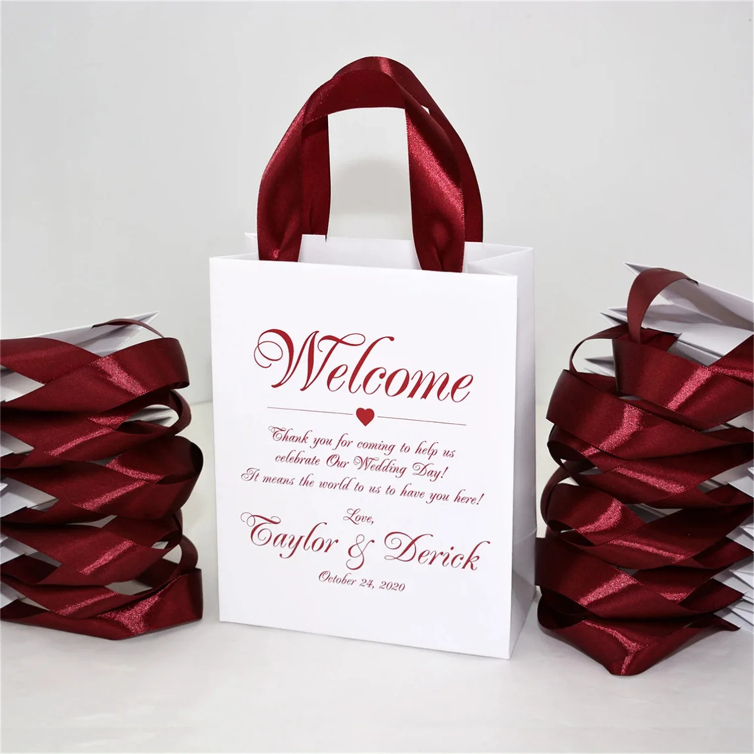 

Dusty Blue Wedding Welcome Bags with satin ribbon handles and your names. Hola Amigos! Mexico wedding gifts and favors for guest