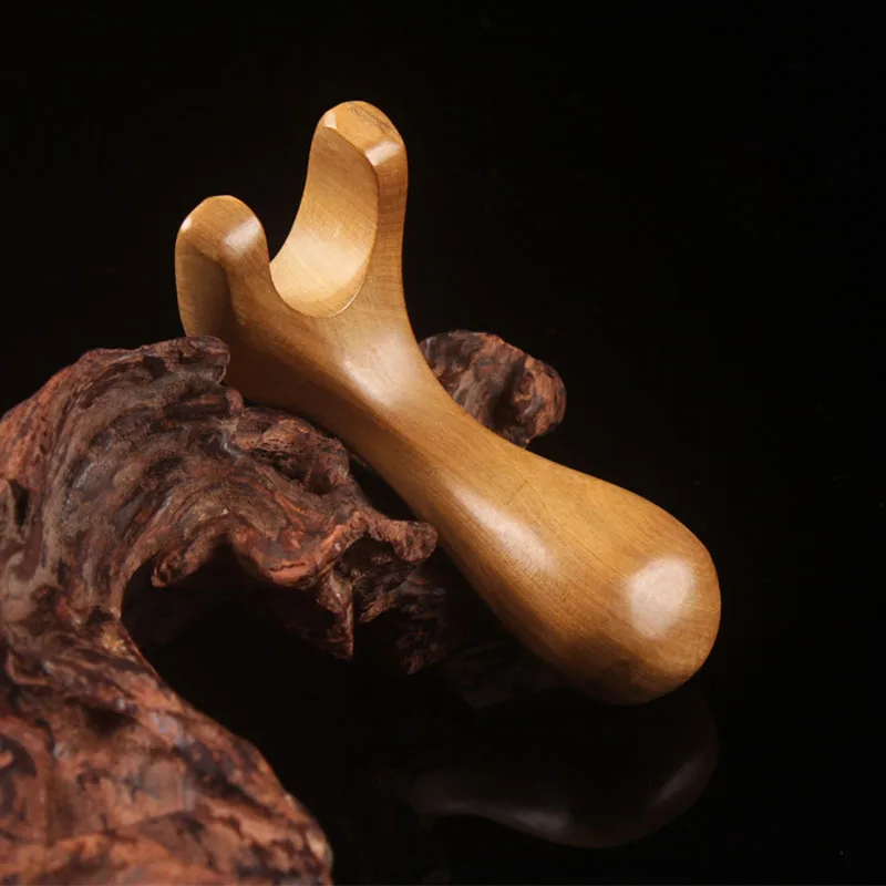 

Wooden mini manual acupoint massage nose palm wood double percutaneous meridian massage roller