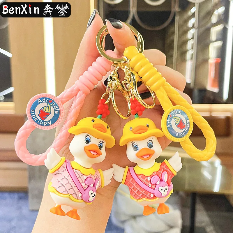 

miniso Crossbody bag, duck keychain, couple schoolbag pendant, claw machine doll, key chain